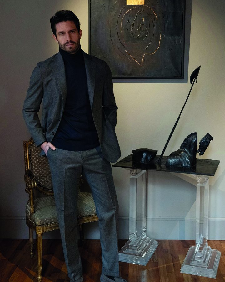 Grey Mandelli jacket over a black turtleneck